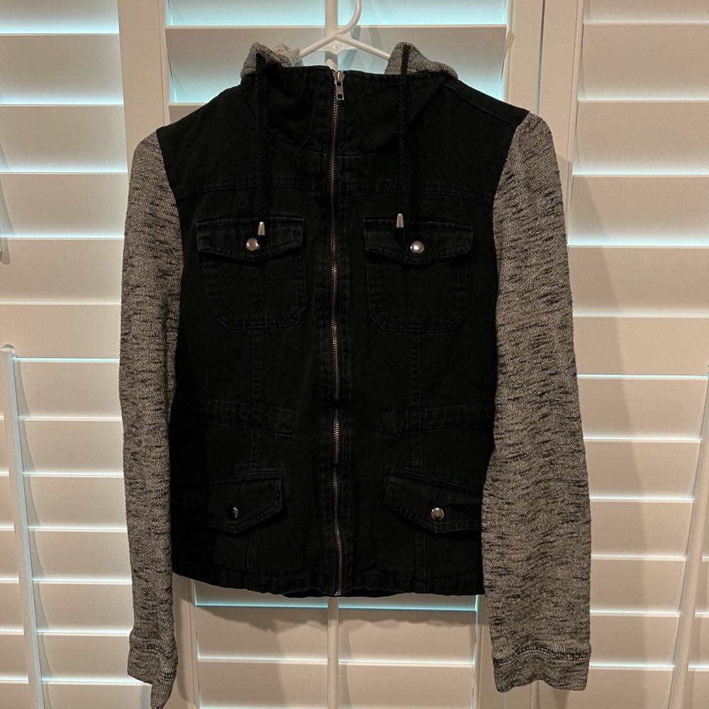 Black Jean jacket with a hood.